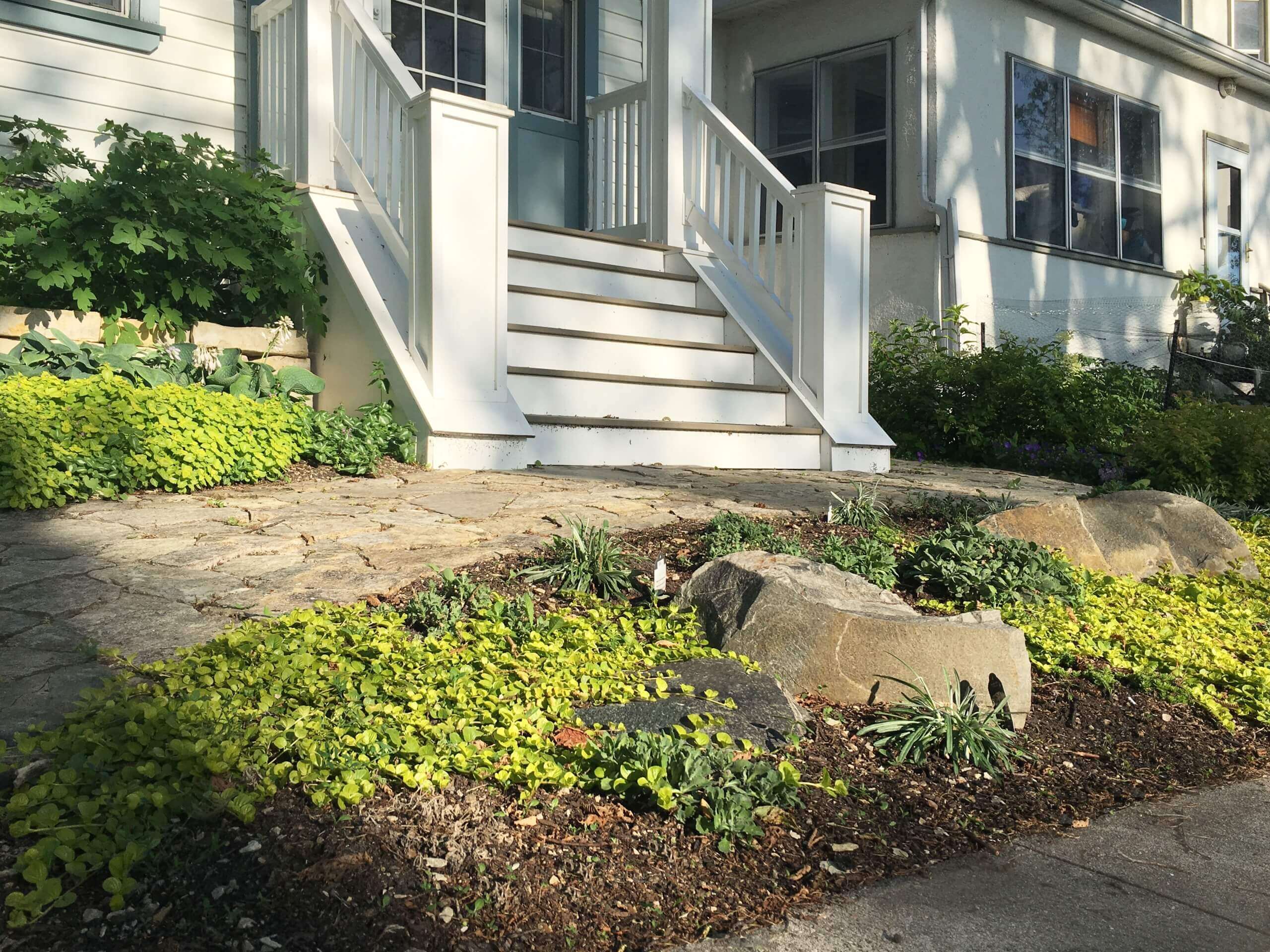 Front yard garden with stone features