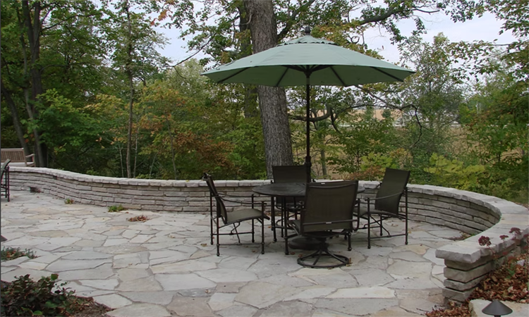 photo of patio made with Fond Du Lac Flagstone and Handstackable Wall Stone